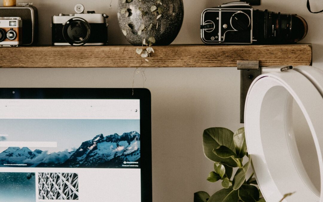 Hybrid working from home - an iMac computer screen sitting on a desk