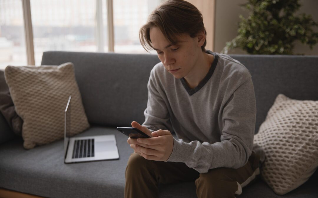 Photo Of Man Using Smartphone