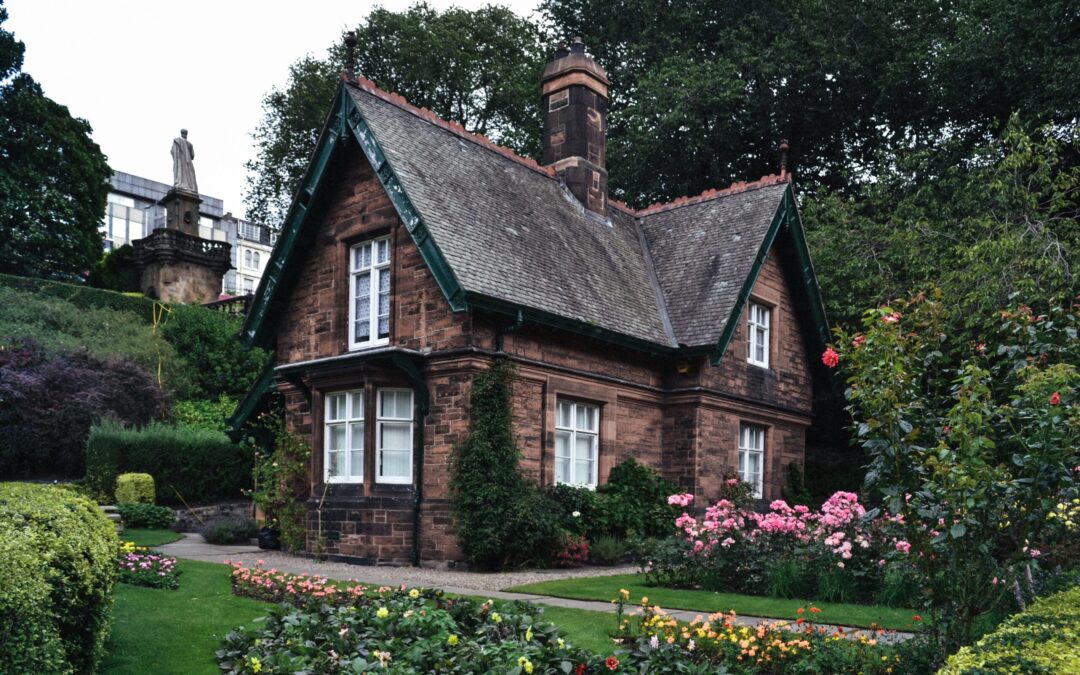 An amazing house in a picturesque garden, looks european.