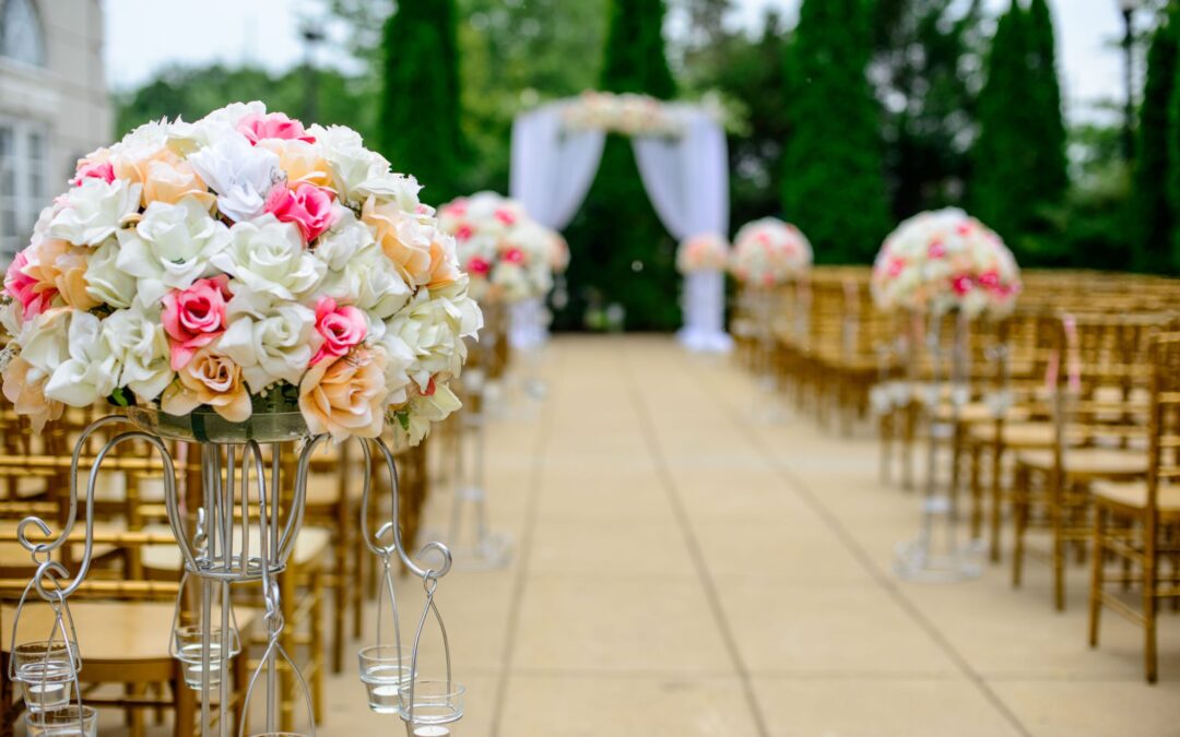 before a wedding the chairs are empty. a bouquet of flowers in the foreground.