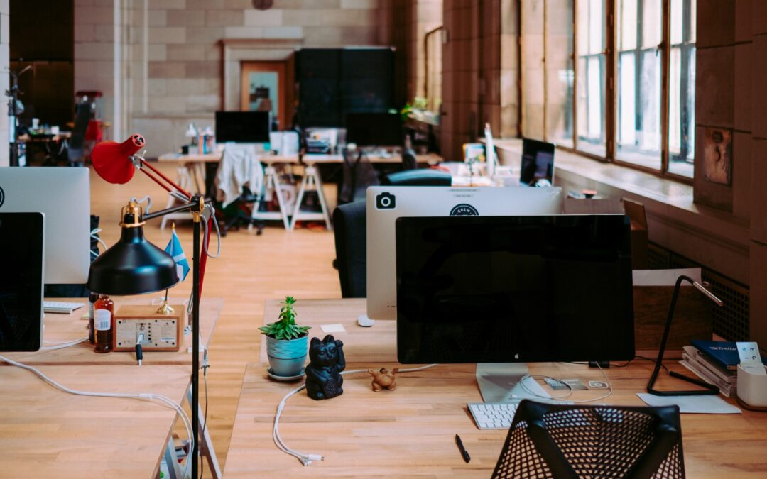 Office workspace, nice wood floors and desks