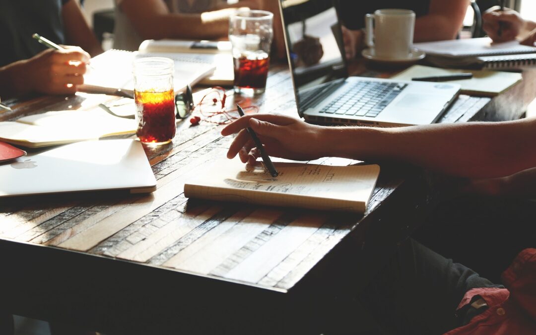 People working on a startup around a table