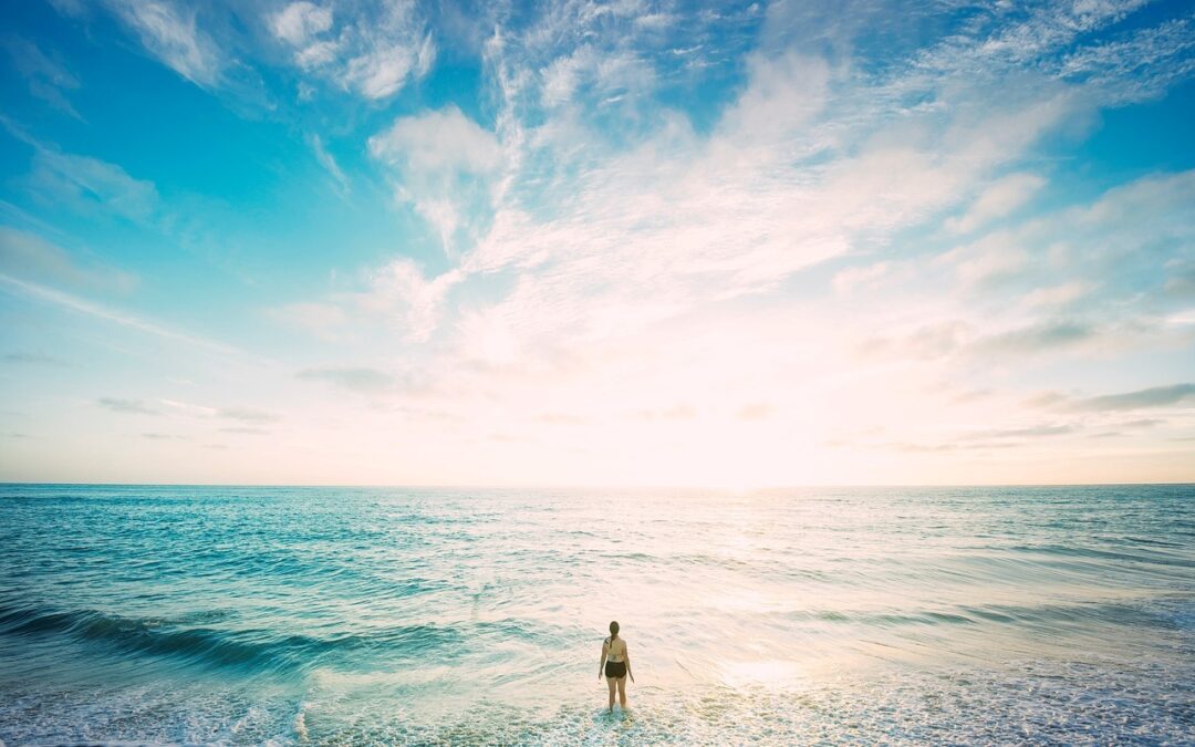 Beach with a Woman looking over the Horizon